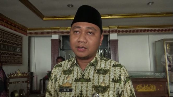 
 caption foto : Bupati Lampura Agung Ilmu Mangkunegara
