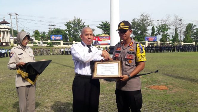 
 Kapolres Lampura Pimpin Upacara HUT Satpam ke-38