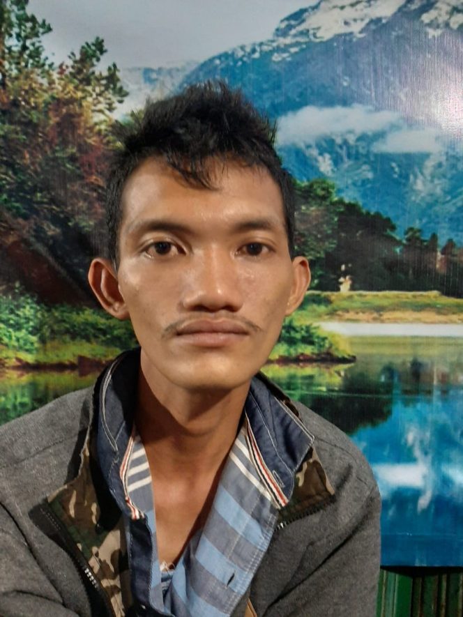 
 Foto Humas Polres Lampura/RNN  Caption : Tersangka Ridho(28) warga Gang Pelangi 2, Kelurahan Kota Gapura, Kecamatan Kotabumi.  