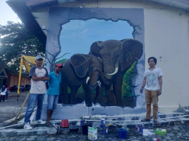 
 caption foto : Inilah lukisan karya Yogi  Pratama yang dinobatkan sebagai juara II perlombaan Mural Competition yang di selenggarakan di UPTD Taman Budaya Provinsi Lampung.
