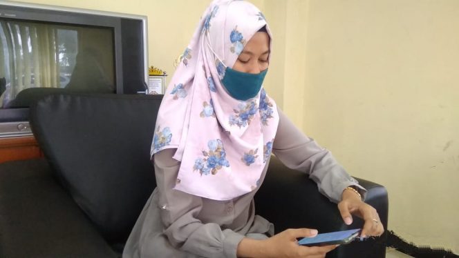 
 caption foto : Nyayu, selaku Supervisor Pelayanan Pelanggan PLN Cabang Kotabumi
