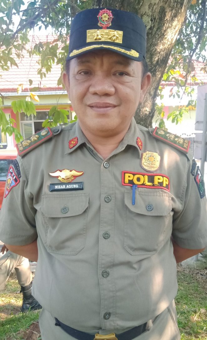 
 Kabid Penegak Perda Sat Pol-PP Lampura Nizar Agung.
